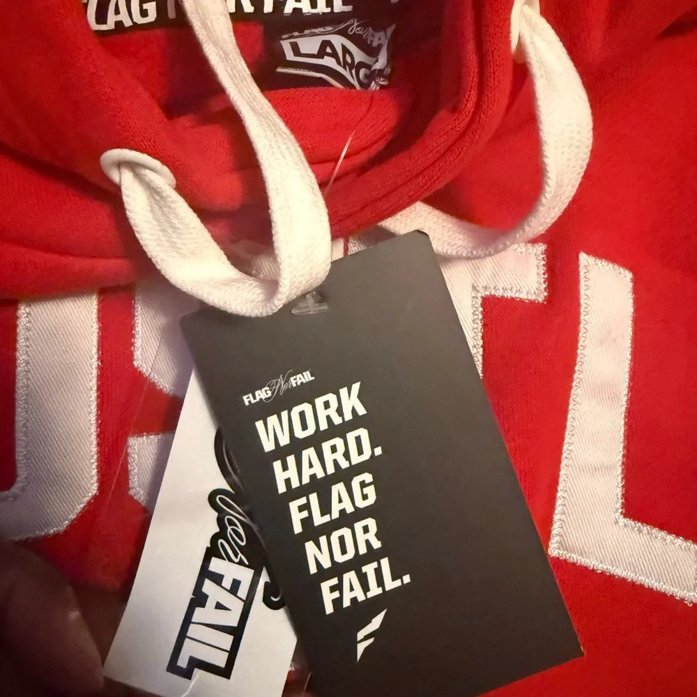 Flag Nor Fail Hustle red hoodie with white lettering. - Picture 3 of 6
